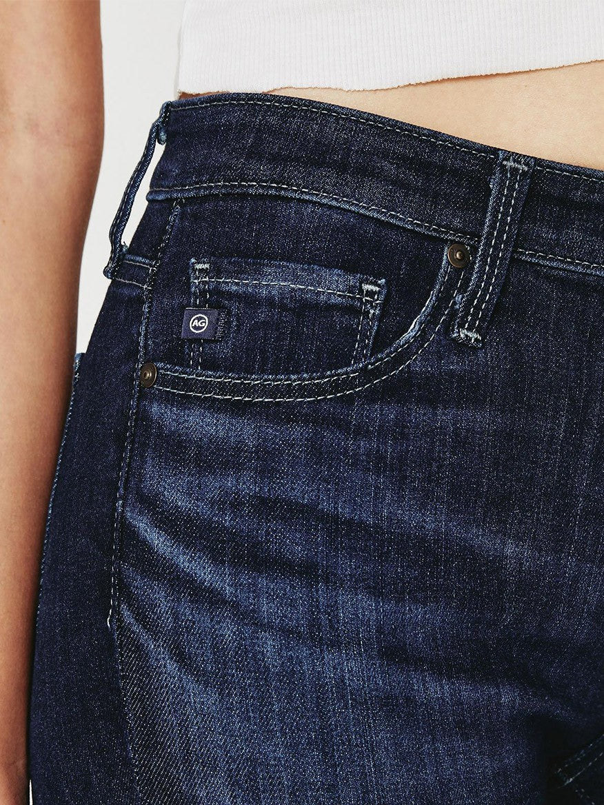 A close up of a woman's AG Jeans Prima Mid-Rise Cigarette in Concord.
