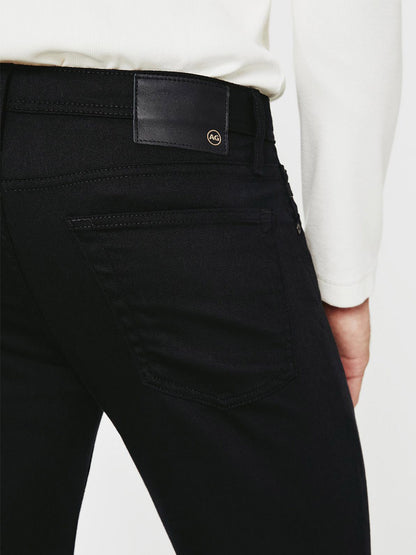 The back view of a man wearing AG Jeans Tellis in Fathom from the Dover Stretch Denim collection.