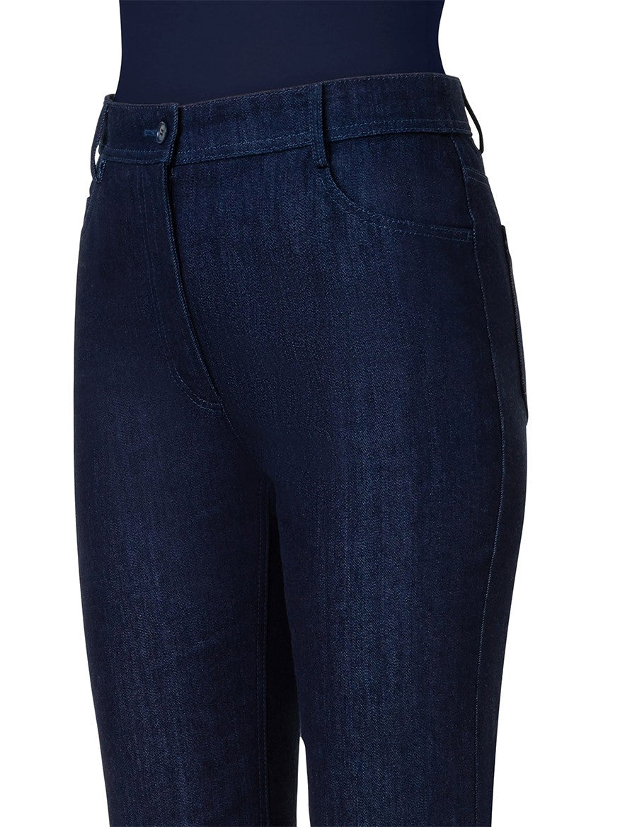 Close-up view of the Akris Punto Cali Stretch Crop Bootcut Denim in Dark Blue, showcasing five-pocket styling, a zipper and button closure, two front pockets, and belt loops.