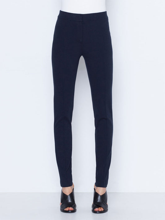 Akris Punto Mara Stretch Jersey Pants in Navy, paired with black open-toe sandals.