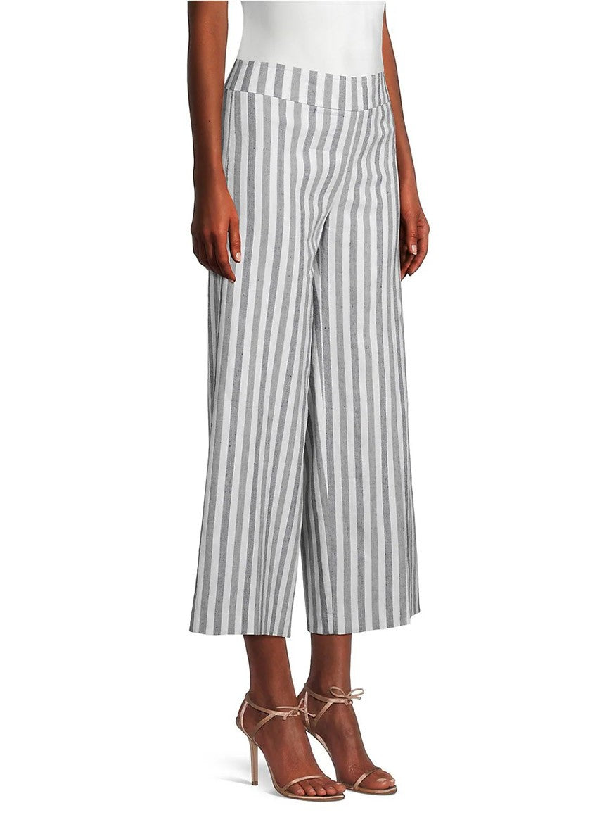 Striped Avenue Montaigne Alex Ankle Crop Pant in Coastal Stripe paired with strappy heels.