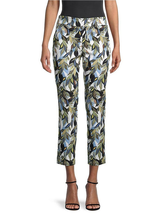 A woman modeling slim-fit Avenue Montaigne Lulu Leaf Print Pant in Amazing Blue Multi and black heeled sandals.