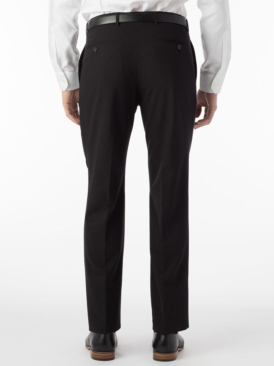 The back view of a man wearing Ballin Connor Comfort 'EZE' Modern Flat Front Pant in Black made of gabardine fabric for stretch and comfort.