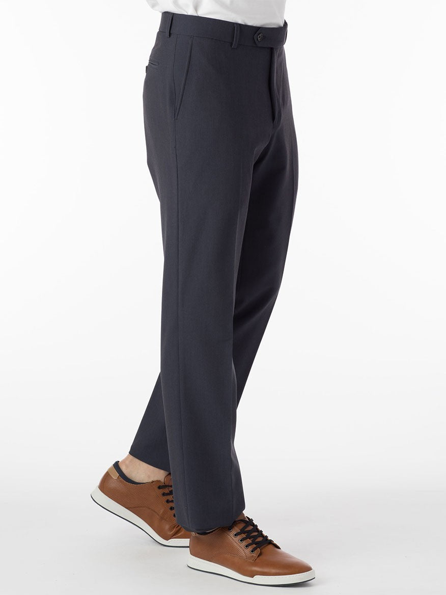 A man is standing in Ballin Connor Comfort 'EZE' Modern Flat Front Pant in Blue Mix, paired with tan shoes.