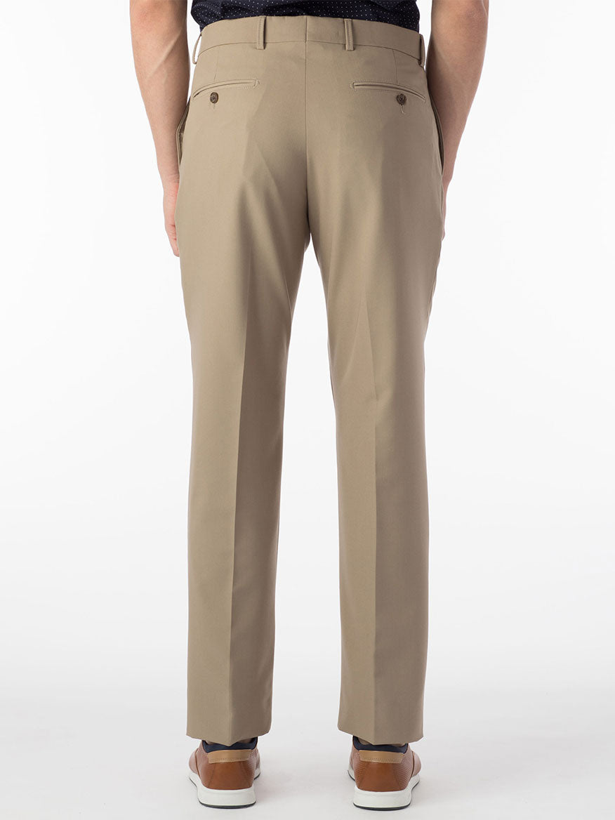 The man is wearing the Ballin Connor Comfort 'EZE' Modern Flat Front Pant in Khaki, made from synthetic gabardine, which provide total comfort and shape retention.