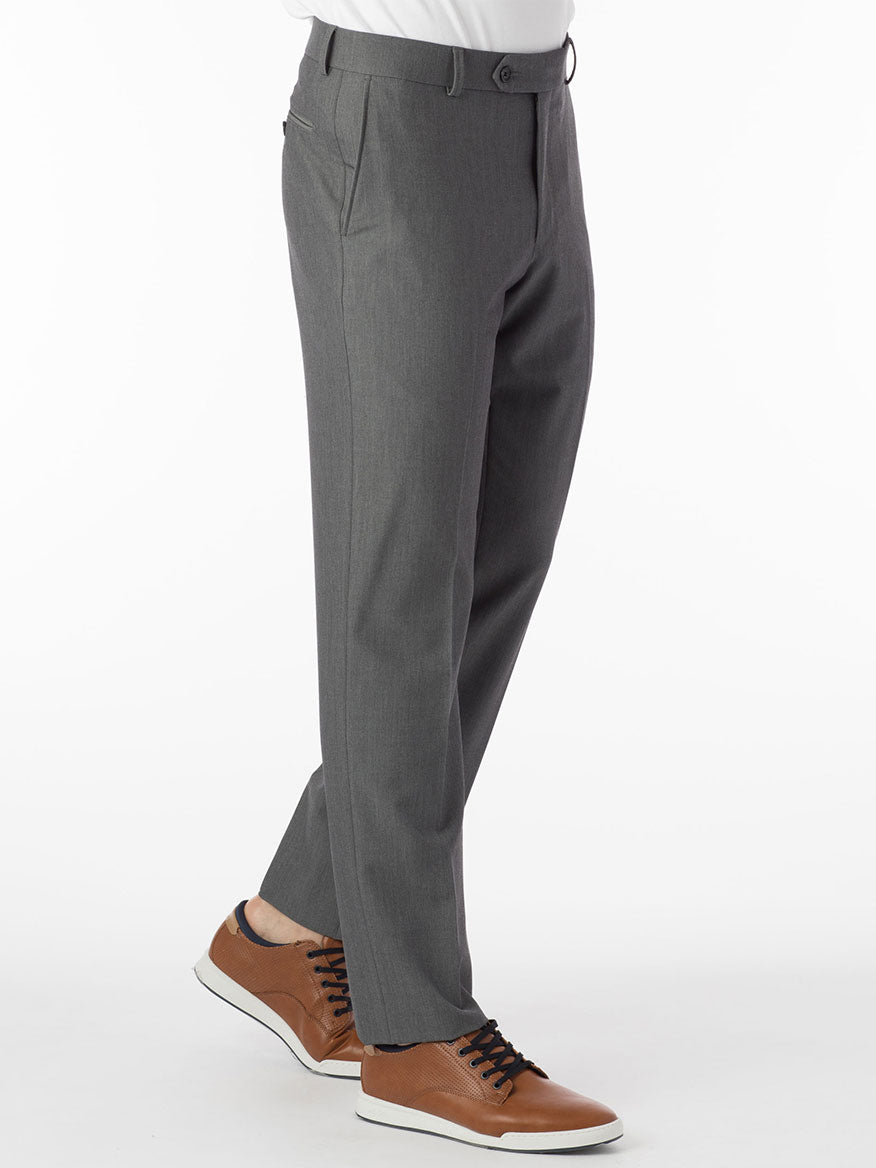 A man is standing in Ballin Connor Comfort 'EZE' Modern Flat Front Pant in Mid Grey suit pants.