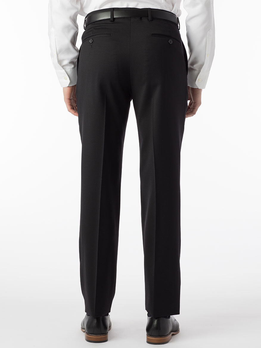 The back view of a man wearing Ballin Theo Comfort 'EZE' Modern Flat Front Pant in Black made from wool gabardine.