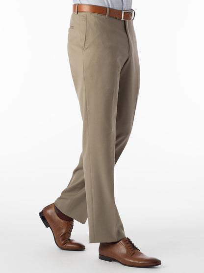 A man in a Ballin Theo Comfort 'EZE' Modern Flat Front Pant in British Tan made of wool gabardine is walking on a white background.