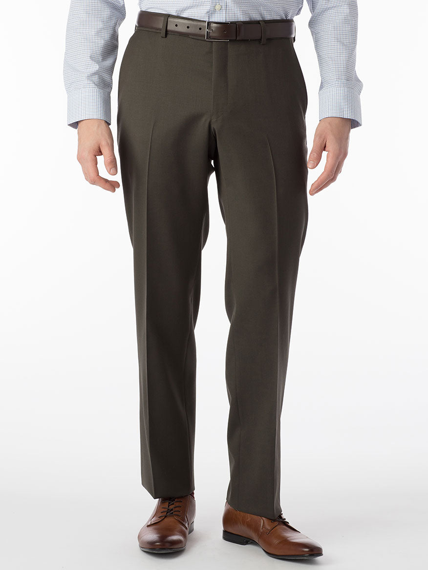 A man wearing Ballin Theo Comfort 'EZE' Modern Flat Front Pant in Loden with a white shirt.