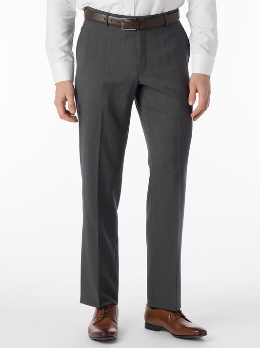 A man is standing in Ballin Theo Comfort 'EZE' Modern Flat Front Pant in Mid Grey made from wool gabardine, designed for comfort and EZE.