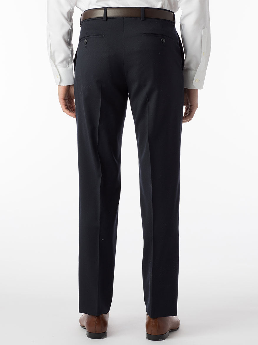 The back view of a man wearing dress slacks with Ballin Theo Comfort 'EZE' Modern Flat Front Pant in Navy providing comfort and infused with silk protein for added luxury.