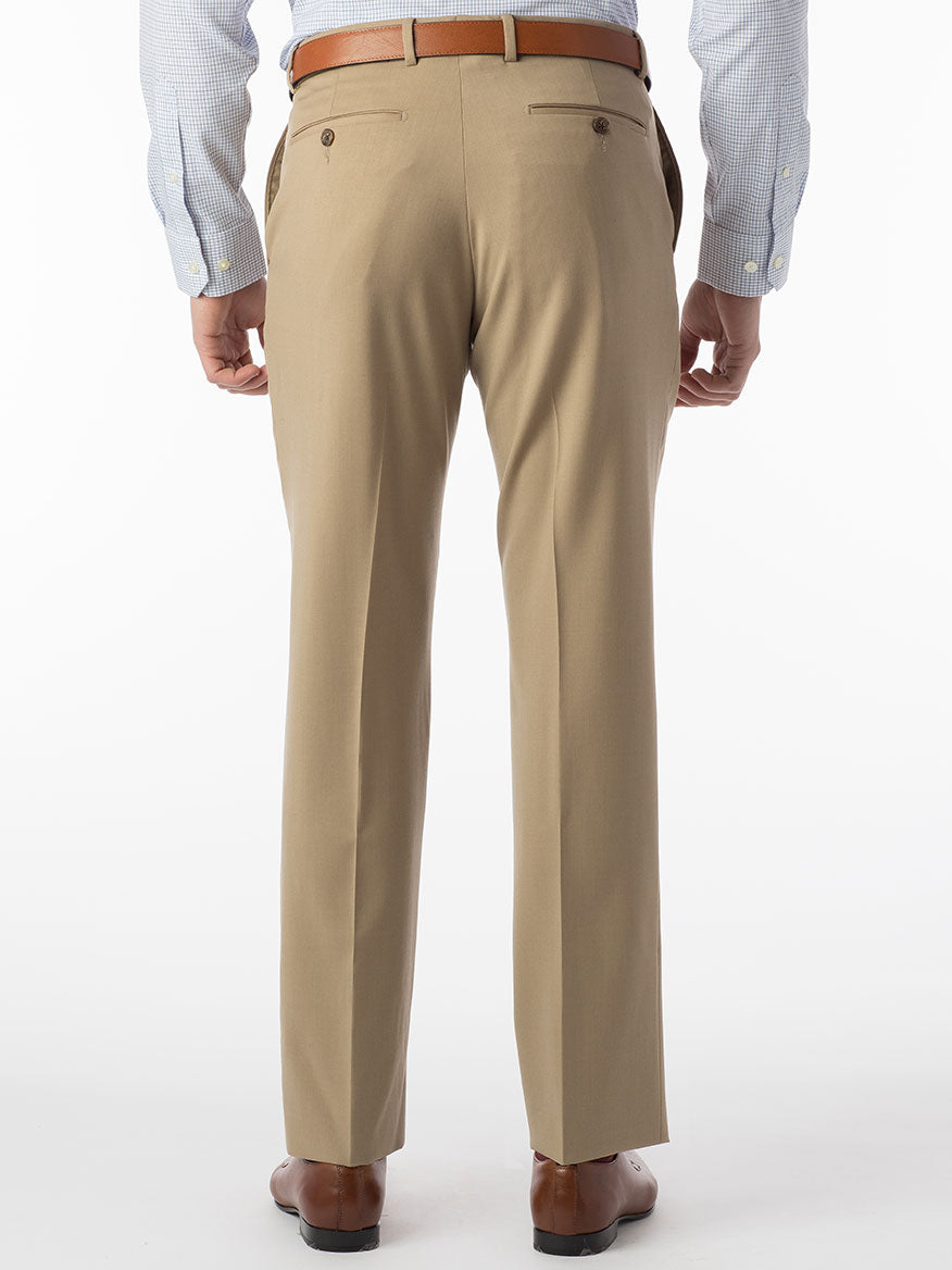 The back view of a man wearing the Ballin Theo Comfort 'EZE' Modern Flat Front Pant in Tan made of wool gabardine.