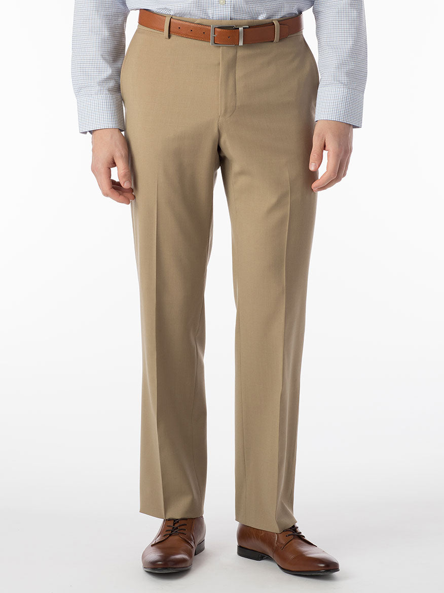 A man wearing a Ballin Theo Comfort 'EZE' Modern Flat Front Pant in Tan suit in wool gabardine fabric.