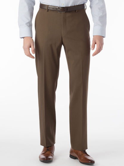 A man wearing brown dress pants with a comfortable "Ballin Soho Comfort 'EZE' Super 120s Modern Flat Front Twill Pant in Saddle" waistband and a white shirt.