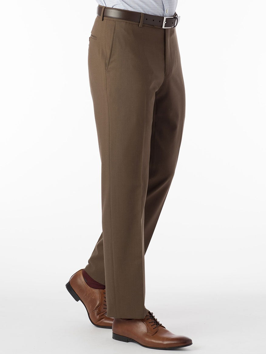 A man wearing brown dress pants with a Ballin Soho Comfort 'EZE' waistband and a white shirt.