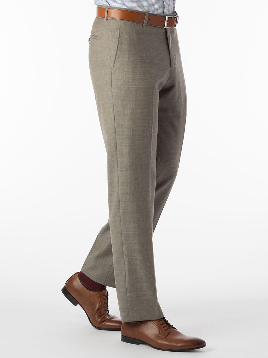 A man wearing a tan suit with Ballin Soho Comfort 'EZE' Sharkskin Modern Flat Front Pant in British Tan construction.