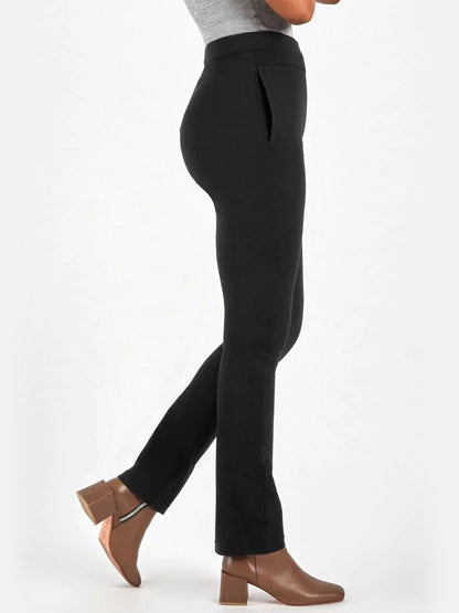 The back view of a woman wearing Capsule 121 Pisces Pant in Black with a seamed waistband.