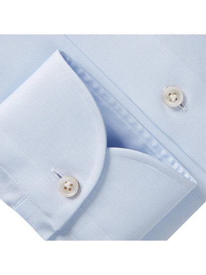 Close-up of an Emanuel Berg Premium Luxury Dress Shirt in Light Blue cuff with Mother of Pearl buttons.