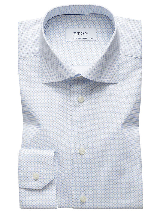 A neatly folded Eton Contemporary Fit Sky Blue Micro Print Dress Shirt displayed on a white background. Made from Eton's fine poplin fabric, the label inside reads "ETON," and the size information is visible on the collar—truly a timeless wardrobe staple.