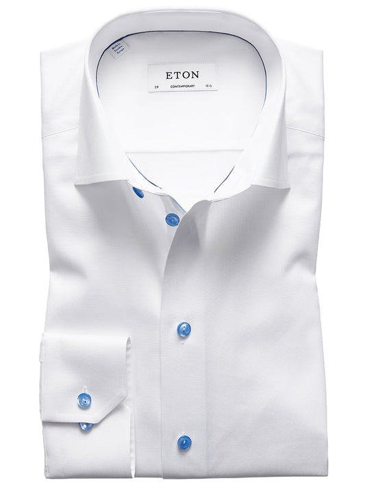 A signature Eton Contemporary Fit White Twill dress shirt with blue details displayed flat.