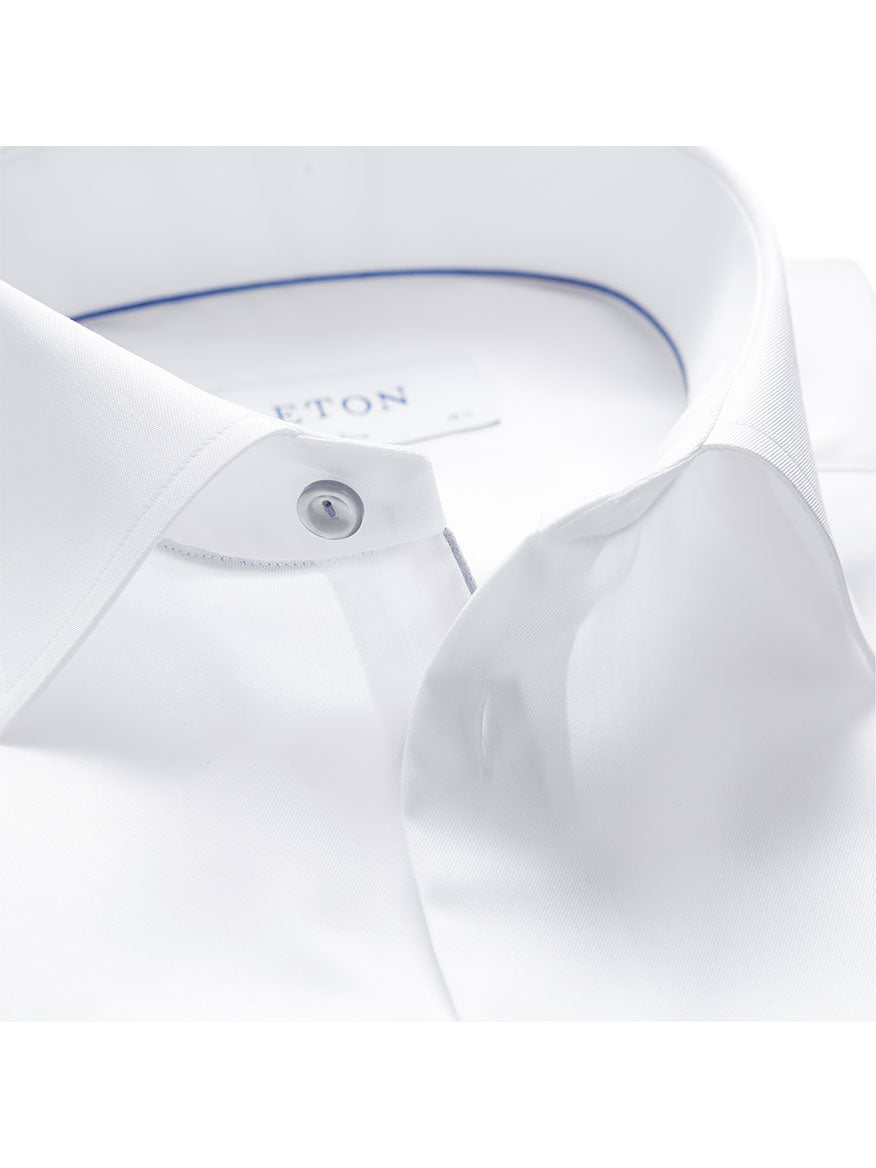 Close-up of the Eton Slim Fit White Twill Dress Shirt, featuring a crisp white button-down collar and subtle grey details on the inside.