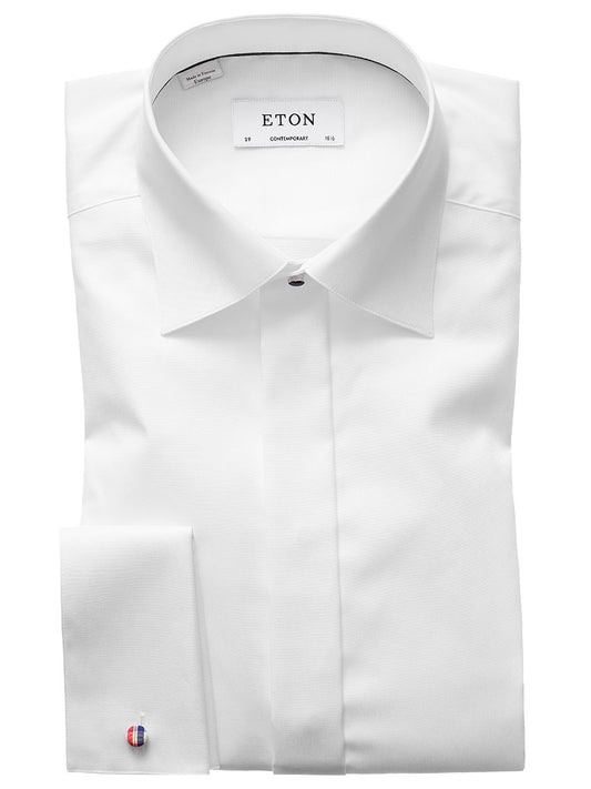 A folded Eton Contemporary Fit White Twill Evening Shirt with a cutaway collar and French cuffs.