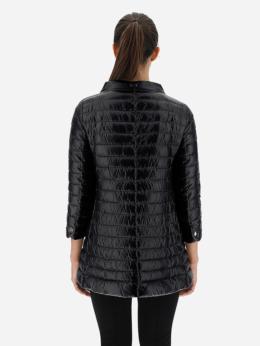 A person with dark hair pulled back is wearing the Herno Rossella A-Shape Jacket in Black, viewed from the back.
