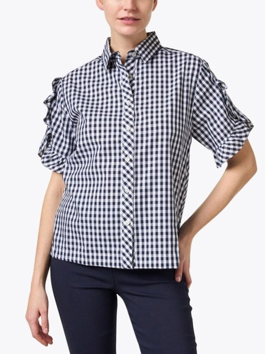 Woman wearing a Hinson Wu Lulu Short Sleeve Mini Gingham Shirt in Navy/White and navy trousers by Hinson Wu.