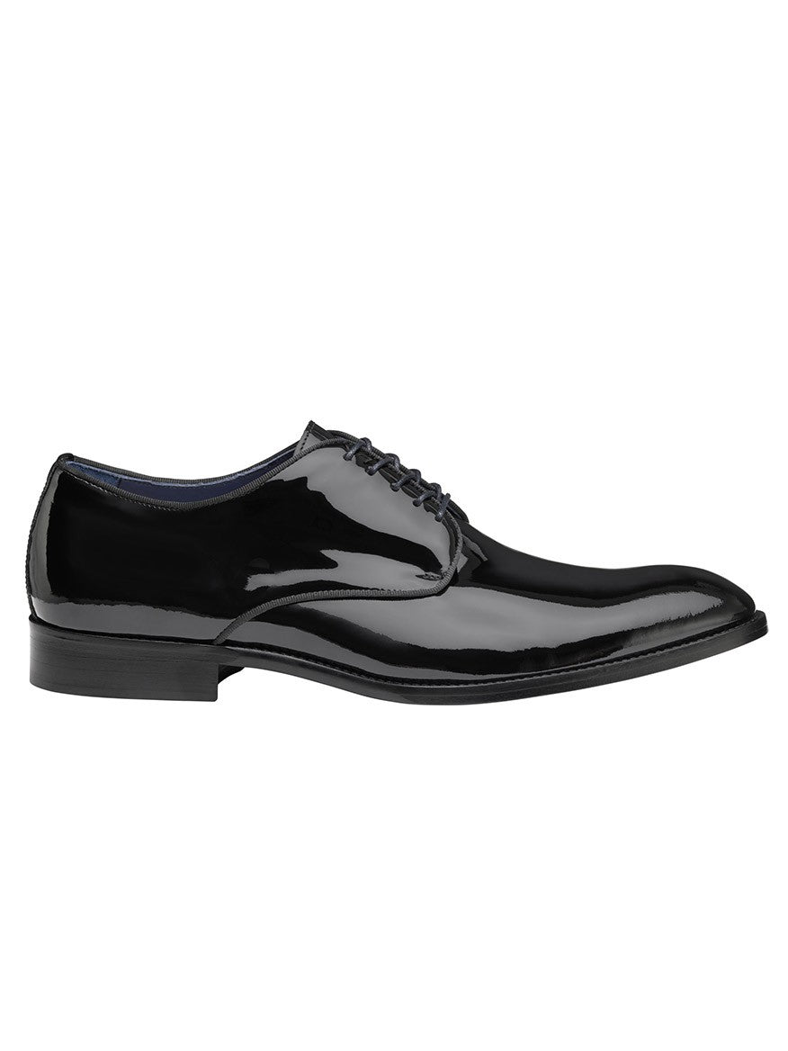 A J & M Collection Kinser Plain Toe in Black Italian Patent Calfskin with a low heel and lace-up design, featuring an Italian upper and a leather-covered footbed for exceptional comfort.