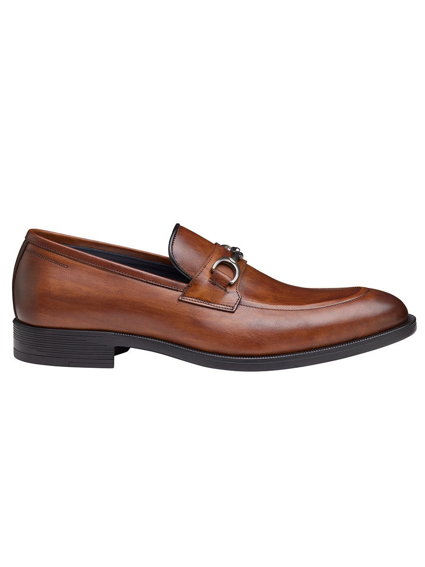 A men's J & M Collection Flynch Bit in Tan Italian Calfskin with a buckle on the side from Johnston & Murphy Collection.