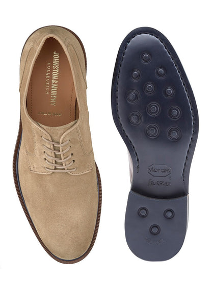 Top view of a taupe Italian suede J & M Collection Hartley Plain Toe shoe next to its blue Vibram EVA outsole, highlighting the shoe's design and texture.