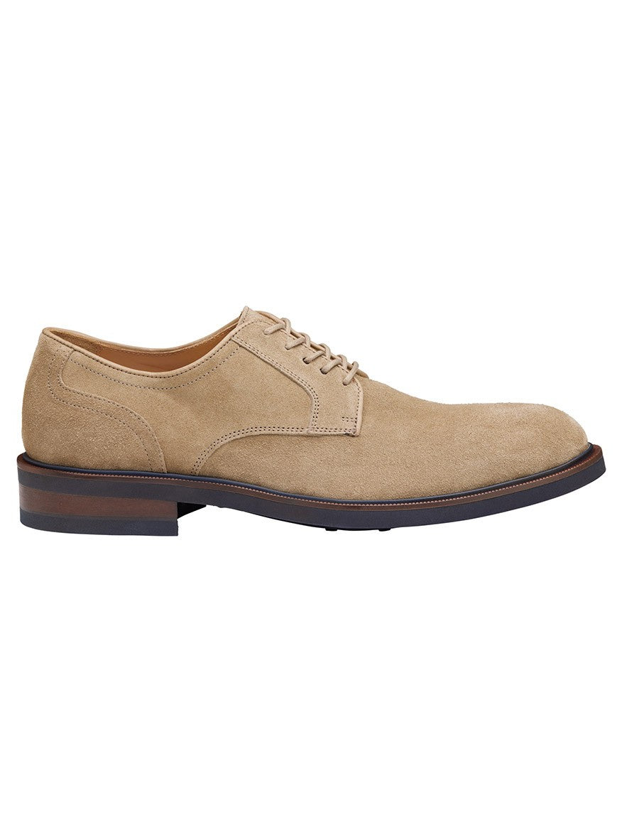 A side view of a single J & M Collection Hartley Plain Toe in Taupe Italian Suede men's dress shoe with laces on a white background.