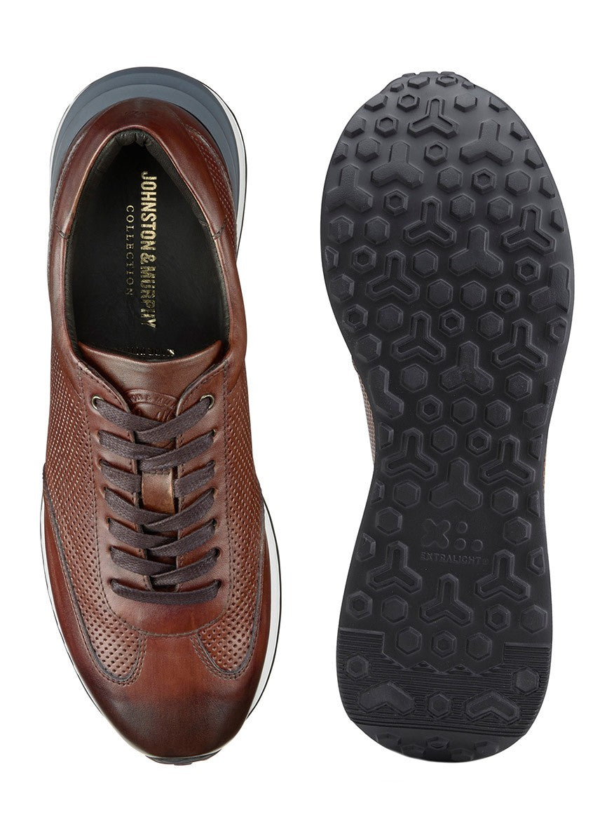 A top view of a J & M Collection Briggs Perfed U-Throat in Brown Italian Calfskin alongside its XL Extralight® EVA outsole.