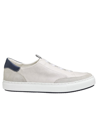 A white and blue retro-style J & M Collection Anson Stretch Lace-to-Toe White English Suede/Sheepskin slip on sneaker with cushioning.