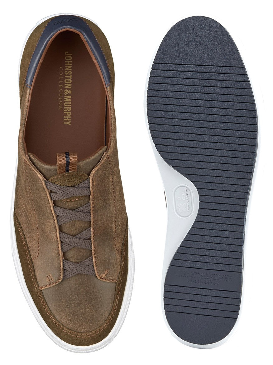 The J & M Collection Anson Stretch Lace-to-Toe in Brown English Suede/Sheepskin is pictured from top and bottom, featuring soft sheepskin suede, white soles, and dark brown laces for a casual look.