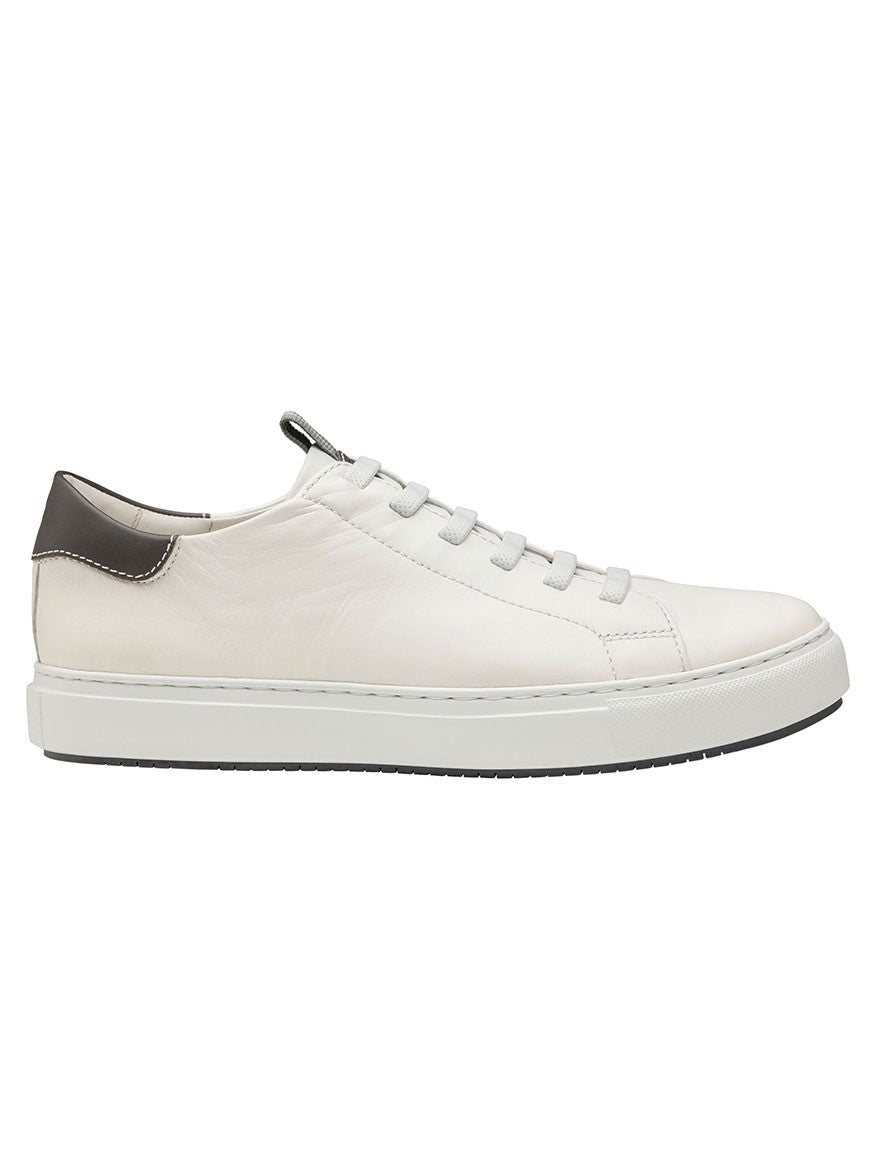 J & M Collection Anson Lace-to-Toe in White Sheepskin Grey Trim features low-top leather sneakers with a black heel tab, white laces, and a flexible EVA sole for modern cushioning. Side view.