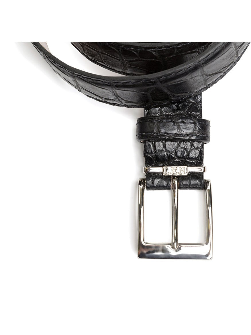 The LEN Belts American Alligator Belt in Black features a luxurious black leather with an alligator texture and a silver buckle.