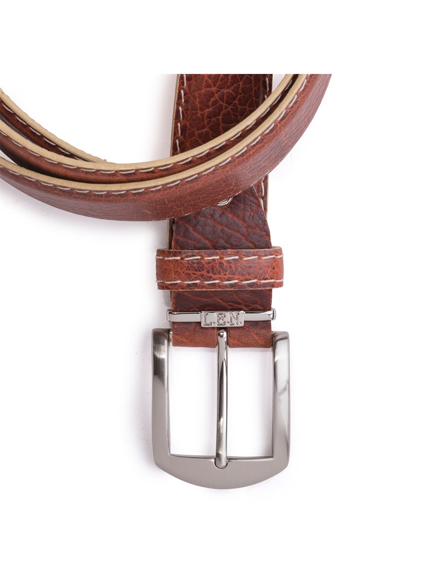 A cognac-colored leather casual belt with beige stitching and a silver rectangular buckle engraved with the initials "L&M". Crafted from premium American Bison hide, this LEN Belts creation appears coiled with the buckle prominently displayed. Made in USA.