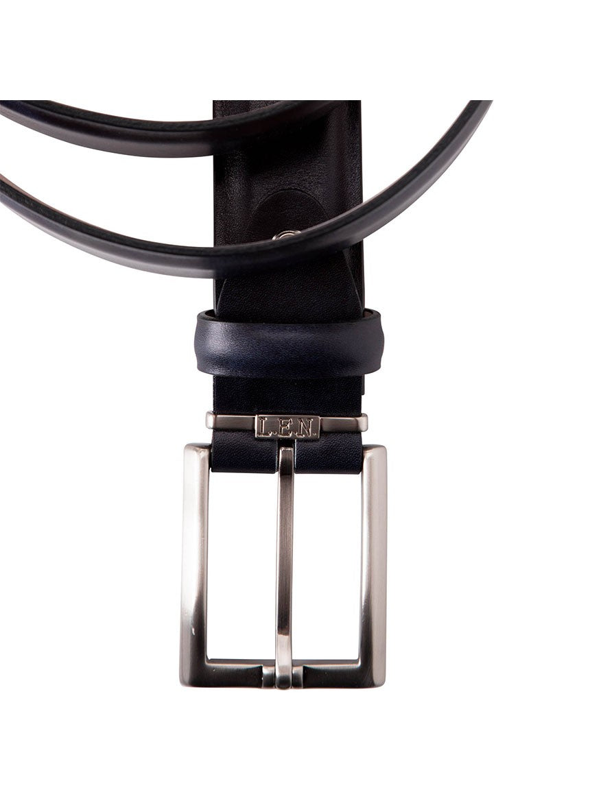Product Name: LEN Belts Italian Marbled Calf Belt in Navy
A navy leather belt with a silver rectangular buckle, embossed with the initials "LEN," crafted from Italian Marbled Calf and featuring solid brass hardware.