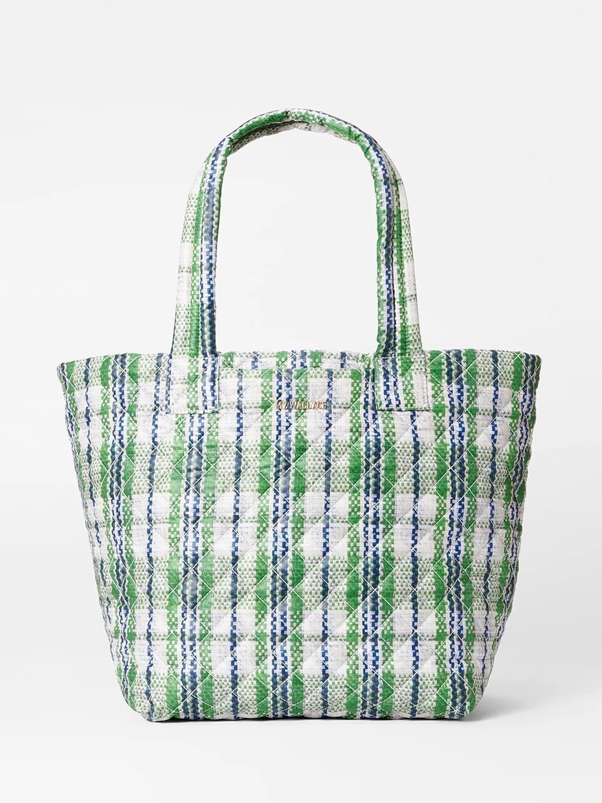 A green and white plaid MZ Wallace Medium Metro Tote Deluxe in Spring Plaid Oxford with long handles against a white background.
