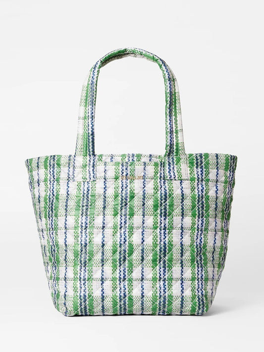 A green and white plaid MZ Wallace Medium Metro Tote Deluxe in Spring Plaid Oxford with long handles against a white background.