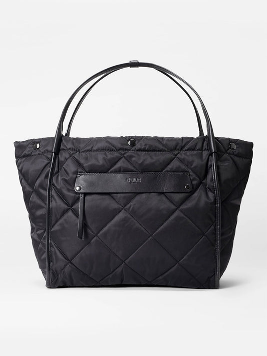 MZ Wallace Quilted Large Madison Shopper in Black Bedford on a neutral background.