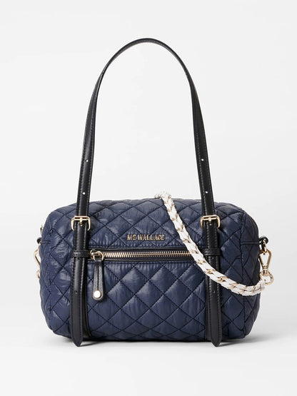 MZ Wallace Small Crosby Barrel in Dawn & White Oxford quilted handbag with dual adjustable leather handles and external zipper pocket, featuring Italian leather trim.