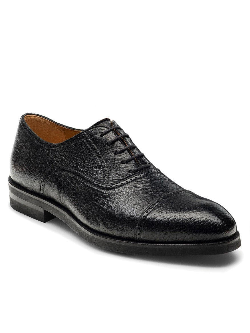 Magnanni Ica in Black cap toe Oxford dress shoe on a white background.