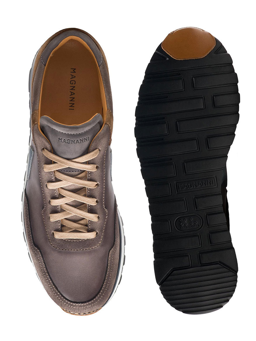 Top and bottom view of a pair from the Magnanni Aero in Grey/Taupe sporty sneaker collection showing the design and soles.