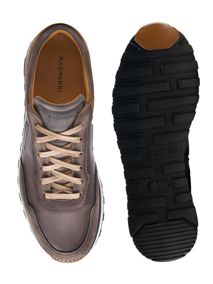 Top and bottom view of a pair from the Magnanni Aero in Grey/Taupe sporty sneaker collection showing the design and soles.