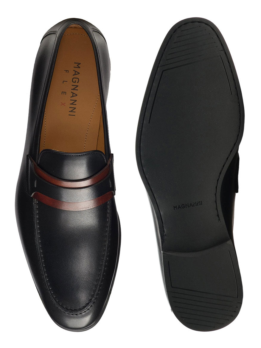 A pair of black Magnanni Daniel penny loafers with a red stripe.