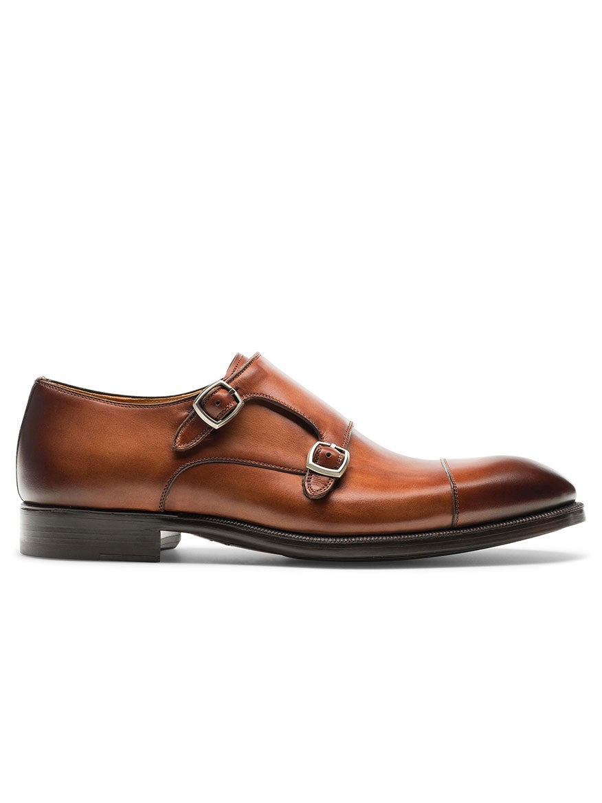 A pair of brown leather Magnanni Harris shoes with a double buckle monk strap.