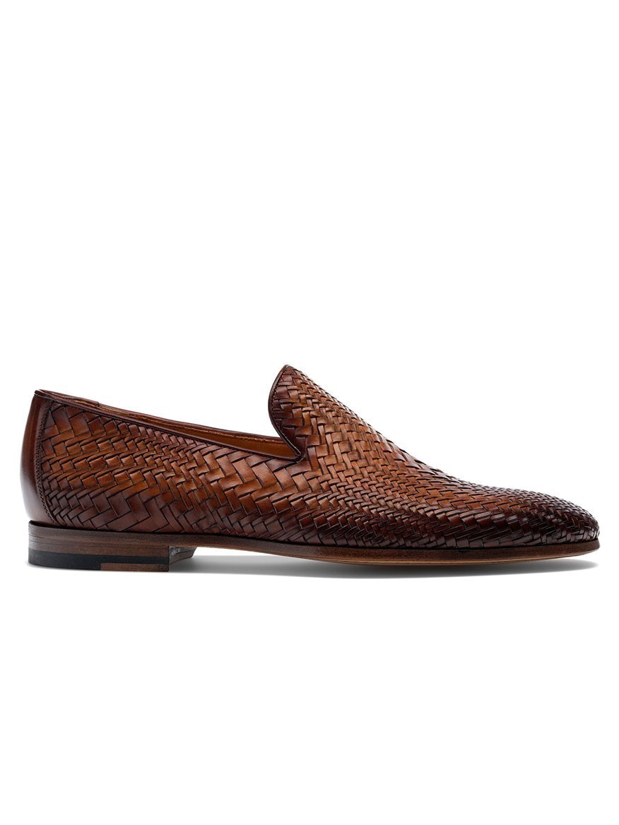 Men's hand-woven brown loafers from Magnanni's Línea Flex Collection. These loafers showcase the expert craftsmanship of Bologna construction.
Product Name: Magnanni Herrera in Cuero
Men's Magnanni Herrera in Cuero loafers from Magnanni's Línea Flex Collection. These loafers showcase the expert craftsmanship of Bologna construction.