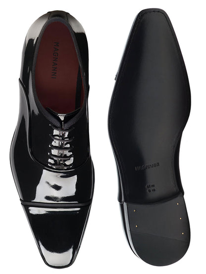 A pair of Magnanni Jadiel in Black Patent Oxford shoes on a white background, ideal for formal attire.